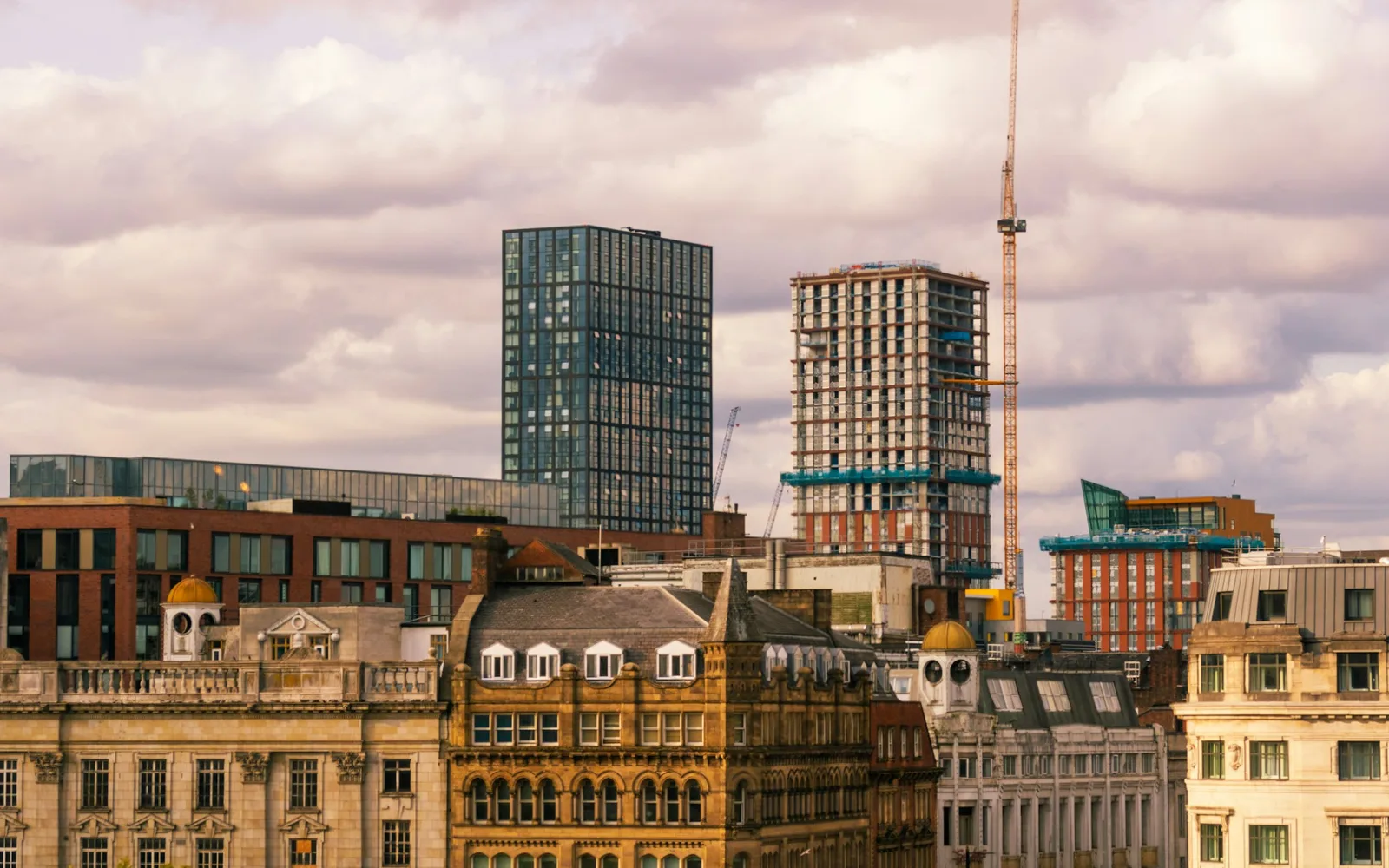 The Manchester skyline in clear daytime light